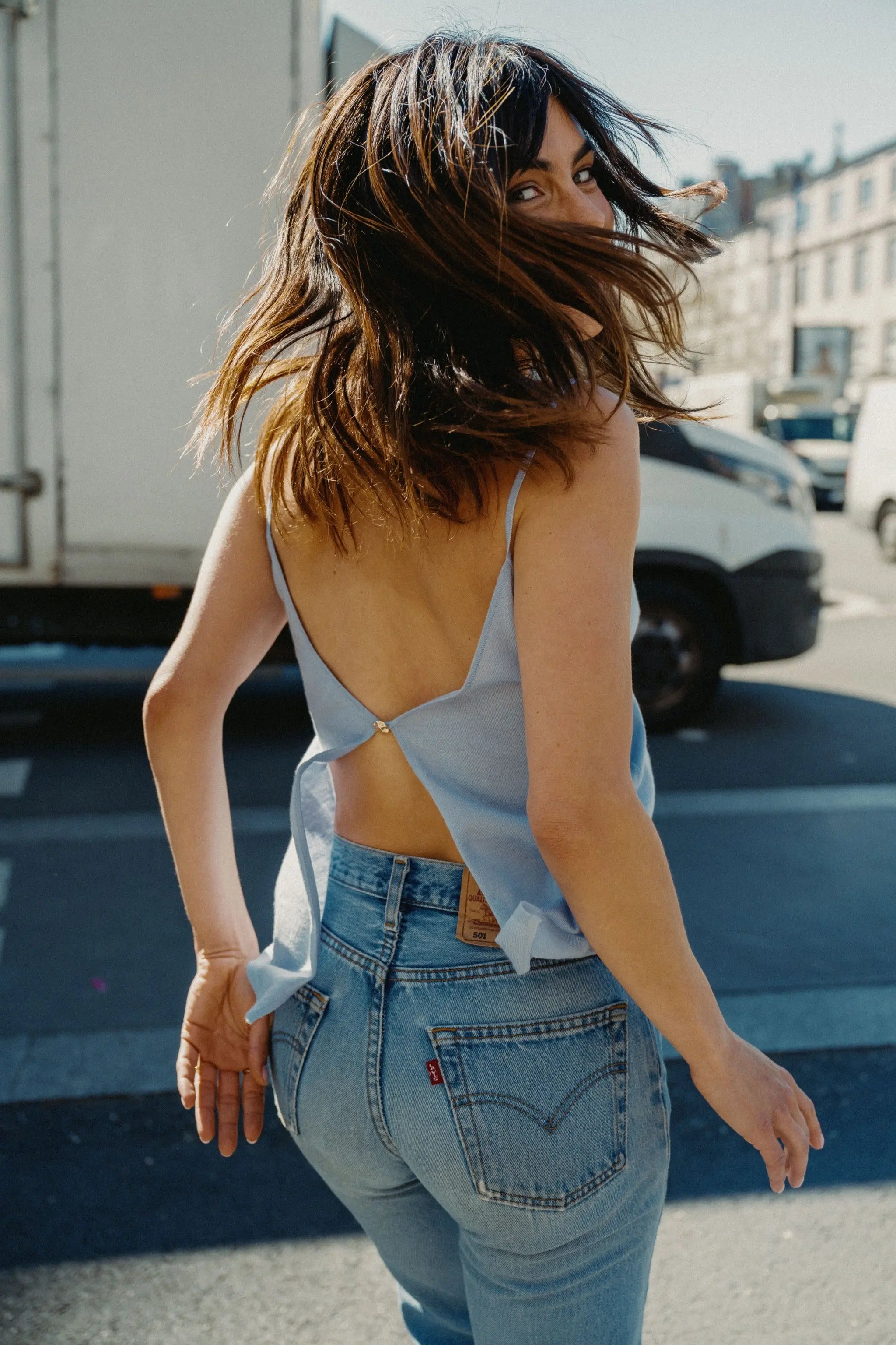 Blue reversible tank top for women, back view with jewel button detail by RAEV.