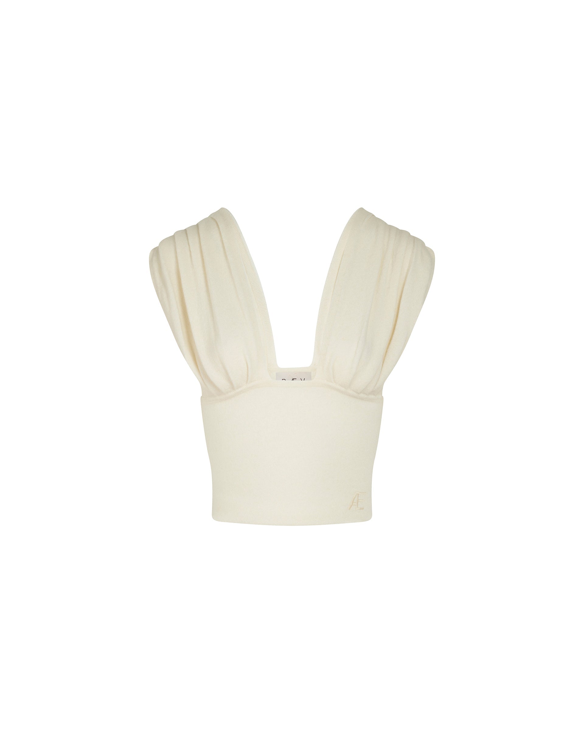Ivory crop top with ruffle detailing on straps, white background.
